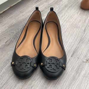 Black Tory Burch leather flats. Size 8.5. Lightly worn.